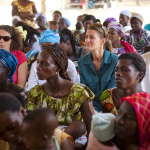Melinda Gates listens with a group at a health post in Dakar, Senegal on July 9, 2012.