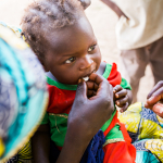 Child receives Mebendazole, used to treat worm infections