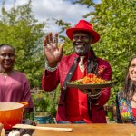 Levi Roots with Dr Clare Mukankusi and Ana Maria Loboguerrero
