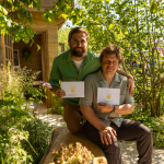Matt Butler and Josh Parker with medals in Garden of the Future