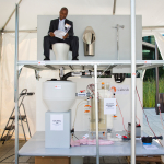 Solar-powered toilet that generates hydrogen and electricity