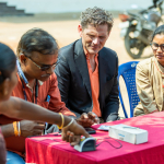 Woman demonstrates access to digital banking
