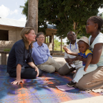 Bill and Melinda Gates with Mwajua Saidi in Mapinga, Tanzania on June 28, 2011.