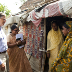 Bill Gates meeting with residents of Ujarion slum in Lucknow, Uttar Pradesh, India on May 30, 2012.
